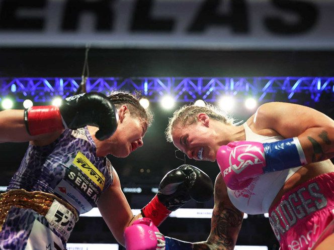 Sorprenden a boxeadora que posó en lencería en el pesaje